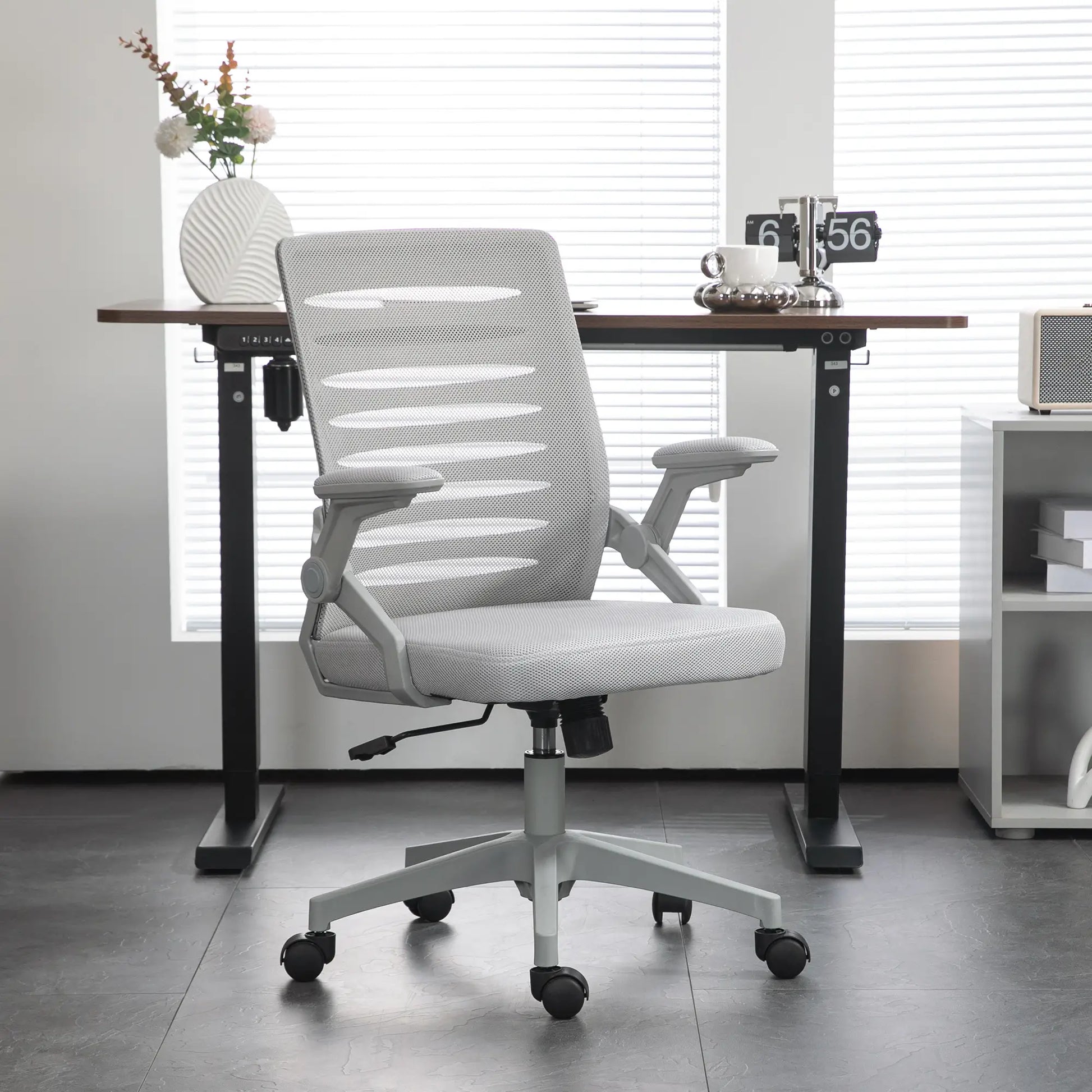 White office chair in front of a desk with a blurred background