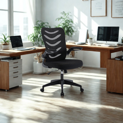 Black office chair in a bright, modern office setting with desks and computers.