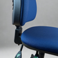 Blue office chair with adjustable armrests on a gray background