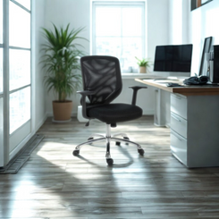 Modern office setup with a black chair, desk, and computer in a bright room.