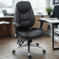 Black office chair in an office setting with blurred background