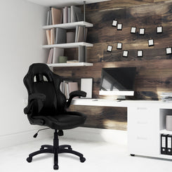 Modern office setup with black chair, desk, and wall decorations.