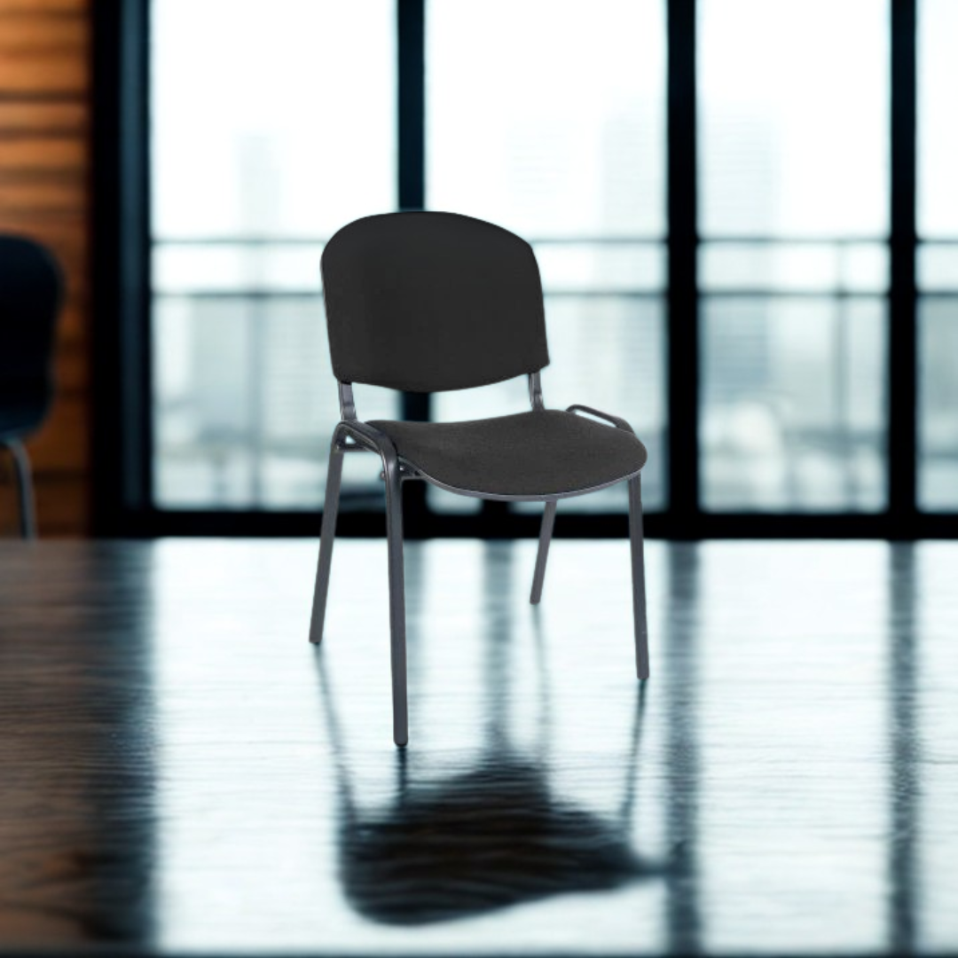 Black chair in a room with large windows