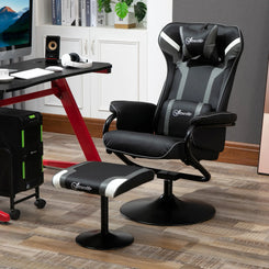A black reclining chair with a headrest and a matching footstool placed in an office setting.