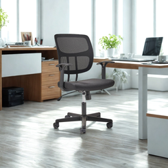Modern office chair in a bright office setting with desks and windows.