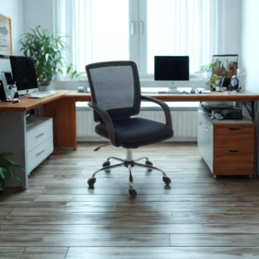 Modern office setup with a desk, chair, and computer monitors.