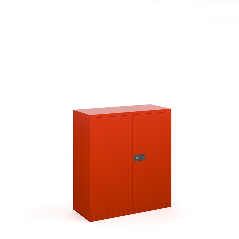 A red steel cupboard with fully lockable double doors and a three-point locking system. It has a flat top and the unit is depicted against a white background.