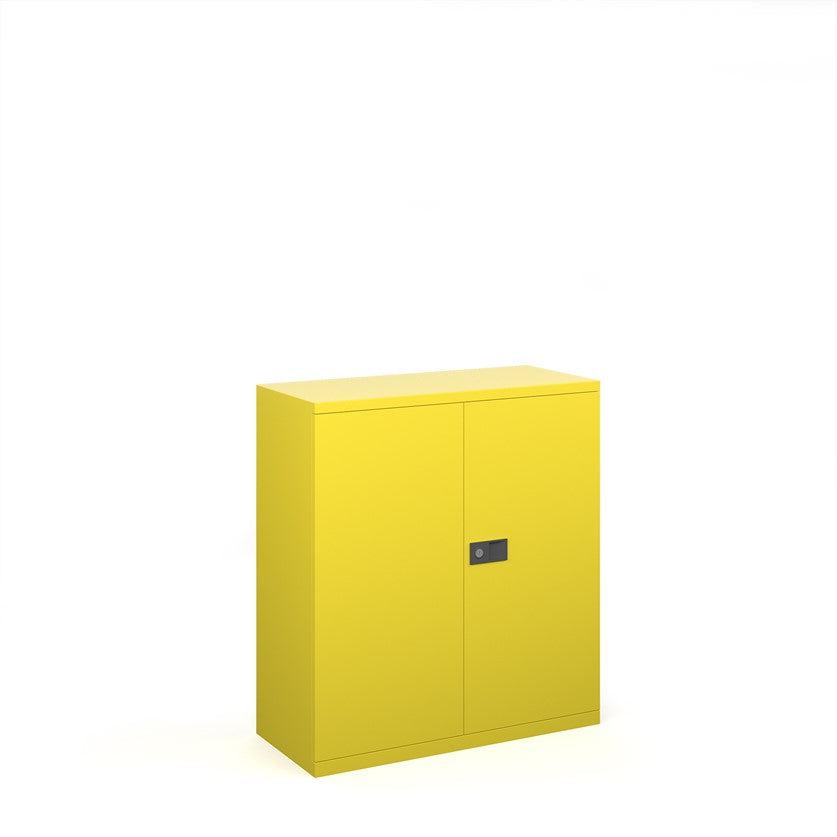A yellow steel cupboard with fully lockable double doors and a three-point locking system. It has a flat top and the unit is depicted against a white background.
