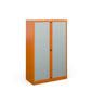 A tall orange cabinet with grey doors.