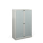 A tall silver cabinet with grey doors. 