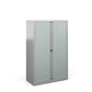 A tall silver cabinet with grey doors.