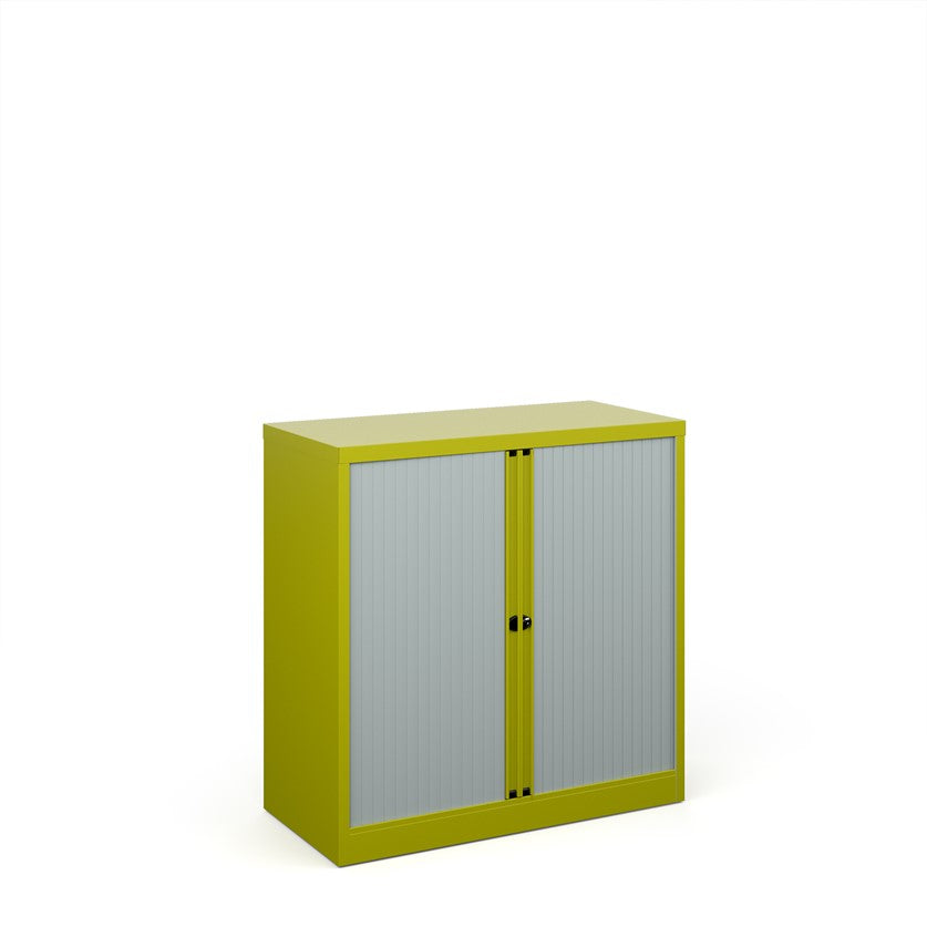 A yellow storage cabinet with tambour doors, fully assembled, with no visible shelves inside.