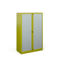 A tall yellow cabinet with silver doors. 