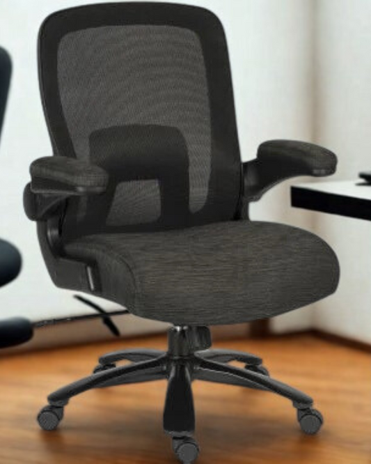 Black office chair with mesh back in an indoor setting