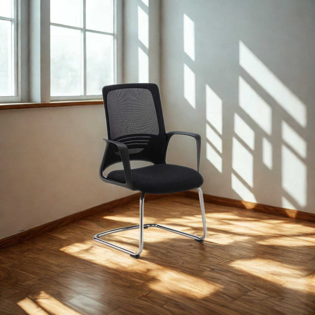 Black office chair in a room with sunlight streaming through windows.