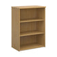 A wooden bookcase with a single opening tambour door and two shelves, made with oak finish. 