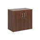 A wooden cupboard with walnut finish, featuring a pair of lockable doors with silver handles and a solid back panel.