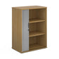 A wooden tambour storage cabinet with a silver tambour door and shelves, set against a white background.
