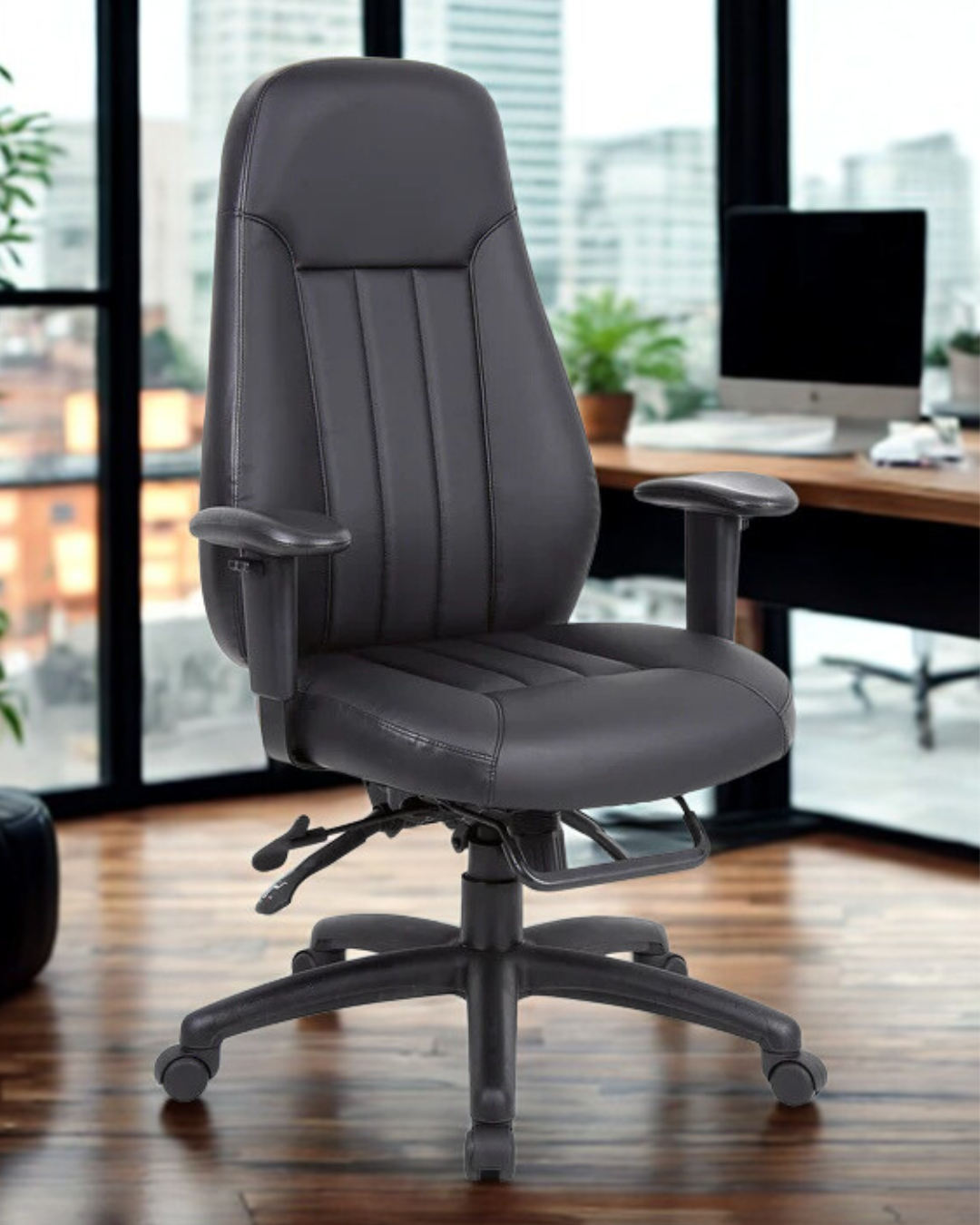 black office chair in a modern office setting with large windows.